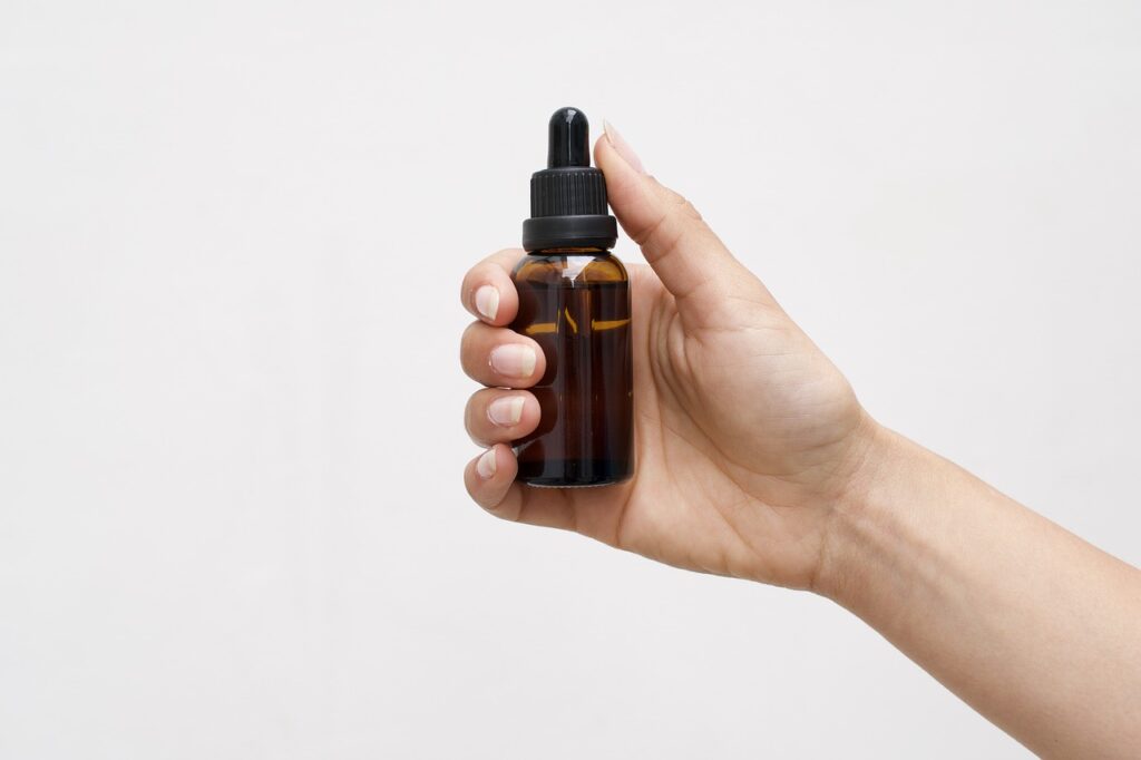 A brown bottle of liquid CBD extract.